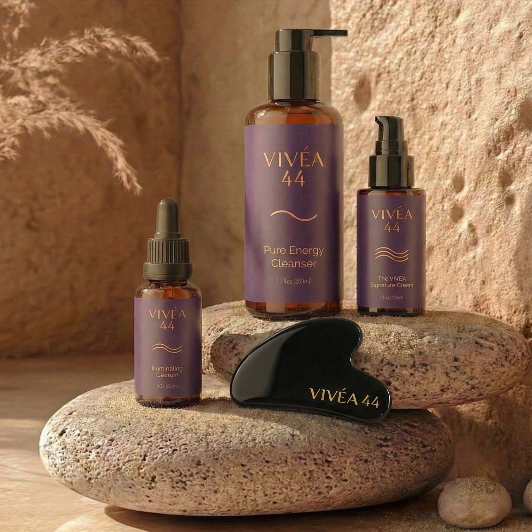 Vivea 44 skincare products on a stone surface with a natural stone background